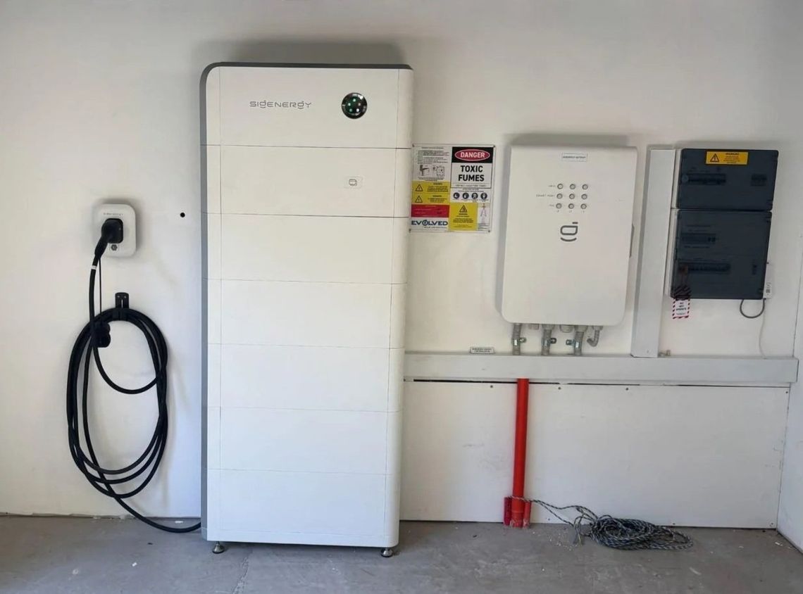 Sigenergy 40 kWh battery, EV charger and gateway installed in a Mudgeeraba garage by Evolved Solar