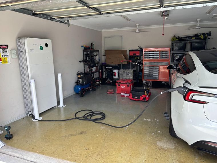 An electric car charging from a Sigenergy DC charger